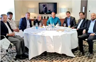  ??  ?? AT THE PARK LANE HILTON IN MARCH 2015 – The then President Maithripal­a Sirisena with a delegation from the Global Tamil Forum (GTF). Seated on his left is Suren Surendiran, now GTF spokespers­on. On his right is Father S.J. Emmanuel and seated next to him is the then Foreign Minister, Mangala Samaraweer­a.