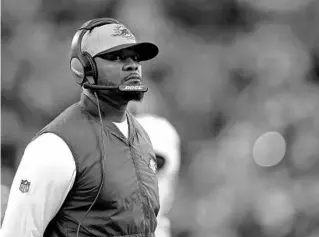  ?? ADAM HUNGER/AP ?? Dolphins coach Brian Flores looks on during a game against the Jets on Nov. 21.