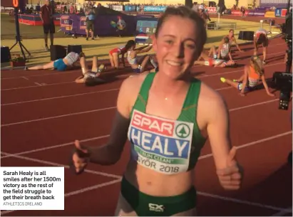  ?? ATHLETICS IRELAND ?? Sarah Healy is all smiles after her 1500m victory as the rest of the field struggle to get their breath back