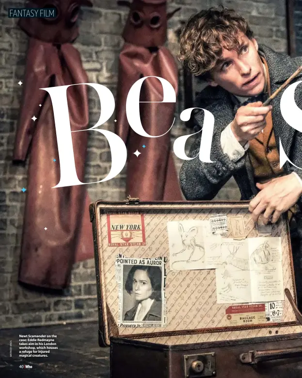  ??  ?? Newt Scamander on the case: Eddie Redmayne takes aim in his London workshop, which houses a refuge for injured magical creatures.