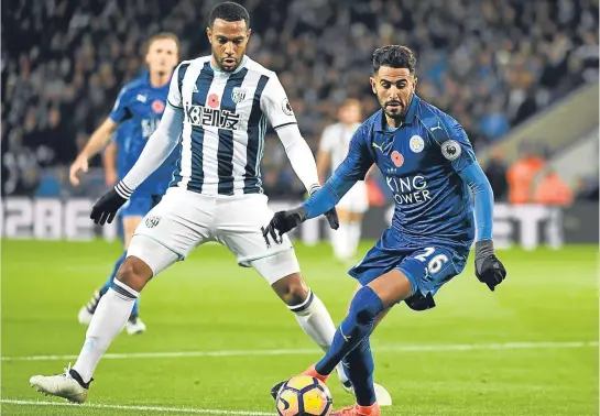  ??  ?? Riyad Mahrez, seen right in action against West Brom’s Matt Phillips, is confident Leicester can keep doing well in the Champions League.
