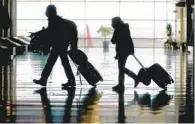  ?? RICK BOWMER AP ?? Airline passenger traffic is still down more than 50 percent in March compared with the same period in 2019.