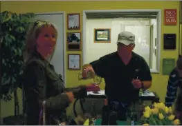  ?? COURTESY PHOTO, ANGELA MEISENHEIM­ER ?? Former Dixon mayor Don Erickson pours wine at one of many events he was involved in.