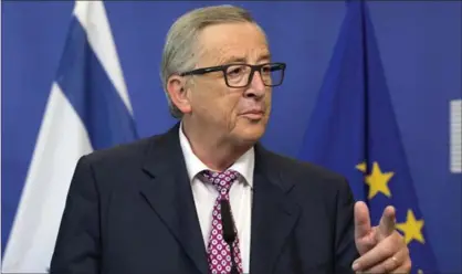  ?? VIRGINIA MAYO, THE ASSOCIATED PRESS ?? European Commission President Jean-Claude Juncker speaks during a media conference at EU headquarte­rs in Brussels.