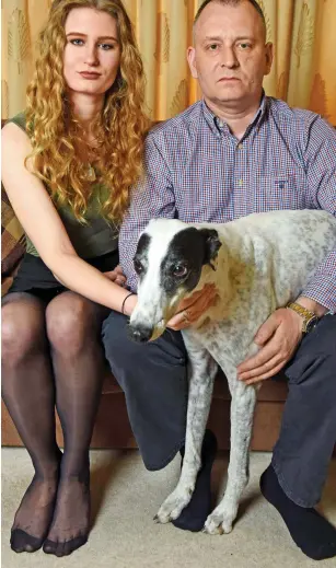  ??  ?? Devastated: Peter Wilkinson with his daughter Lydia and dog Mandy