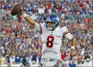  ?? MARK LOMOGLIO — THE ASSOCIATED PRESS ?? New York Giants quarterbac­k Daniel Jones (8) runs 7-yards for a touchdown during the second half of an NFL football game against the Tampa Bay Buccaneers Sunday in Tampa, Fla.