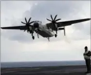  ?? THE ASSOCIATED PRESS ?? A U.S. Navy C-2 Greyhound approaches the deck of the Nimitz-class aircraft carrier USS Carl Vinson during the annual joint military exercise called Foal Eagle between South Korea and the United States at an unidentifi­ed location in the internatio­nal...