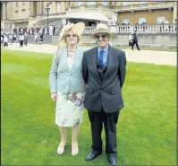  ??  ?? Harry and Pat Cook pictured at Buckingham Palace. .
