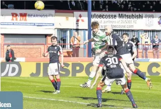  ??  ?? HEADING FOR FIRST CAP Stuart Armstrong impresses with goal at Dens Park