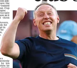  ?? GETTY IMAGES ?? Fan favourite: Steve Cooper celebrates with the Forest faithful after securing Premier League survival last Saturday
