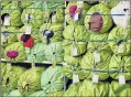  ?? VINCENT TULLO | WASHINGTON POST ?? BAGS FULL of clothes are piled up at the Eileen Fisher warehouse in Irvington, N.Y.