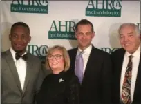  ?? RON BLUM - THE ASSOCIATED PRESS ?? Yankees third baseman Miguel Andujar; Diana Munson, wife of late Yankees captain Thurman Munson; Yankees manager Aaron Boone; and former New York Mets star Ed Kranepool on Tuesday, Feb. 5, 2019, at the Thurman Munson Awards Dinner at the Grand Hyatt New York.