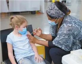  ?? PAUL CHIASSON ARCHIVES LA PRESSE CANADIENNE ?? Seulement
66 % des enfants québécois de 5 à 11 ans ont été vaccinés contre la COVID-19, une proportion bien moindre que chez les adultes.