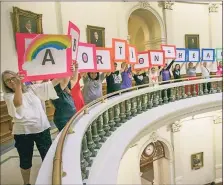  ?? Tribune News Service ?? Abortion rights advocates protest abortion restrictio­ns being debated recently in the Texas House.