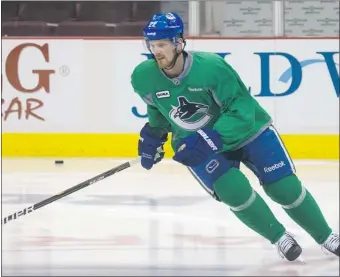  ?? Reuters ?? Vancouver Canucks’ Daniel Sedin, seen practising earlier this month, remains sidelined by a concussion.