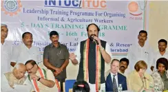  ?? P. ANIL KUMAR ?? TPCC president N. Uttam Kumar Reddy speaks on MNREGA issue at INTUC office in Hyderabad. G. Sanjeev Reddy, R.C. Khuntia and foreign delegates are also seen. —