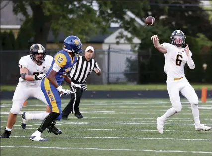  ?? PHOTOS BY GEORGE SPITERI — FOR MEDIANEWS GROUP ?? Lutheran North senior quarterbac­k Zack Selewski flips a pass during the first half of a game against South Lake.