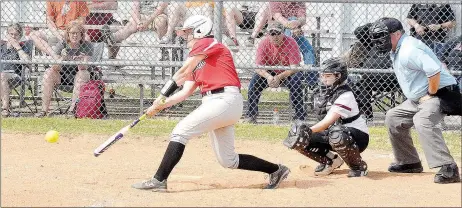  ?? Staff photograph­s by Graham Thomas ?? Senior Lady Blackhawk Pea Ridge batter Sara Whatley takes a swing in the first inning against Siloam Springs Saturday.