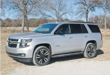  ?? LESLEY WIMBUSH/DRIVING ?? The 2018 Chevrolet Tahoe RST provides a smooth ride over bumps and has good road manners despite its large size.