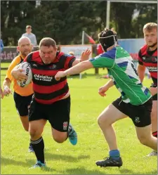  ??  ?? No stopping Patrick Brennan as he charges towards the Gorey line.