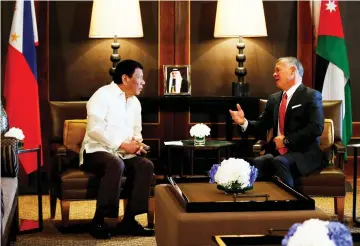  ??  ?? King Abdullah gestures as he meets with Duterte at the Royal Palace in Amman, Jordan. — Reuters photo