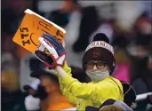  ?? ROSS D. FRANKLIN — THE ASSOCIATED PRESS FILE ?? A San Francisco Giants fan hopes for a baseball to get tossed his way during the fourth inning of a spring training game against the Cleveland Indians on Tuesday, March 23, in Goodyear, Ariz.