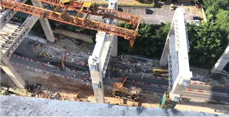  ?? — Bernama file photos ?? Three foreign workers were killed, while one person was injured, when a crane structure at the SUKE constructi­on site fell and crushed a car on March 22 last year.