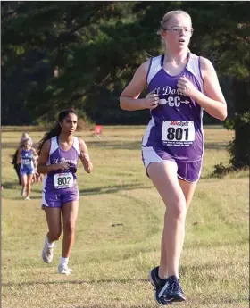  ?? Siandhara Bonnet/News-Times ?? On the move: El Dorado runners, front, Eliza Brewster and Priya Dod in back competed in the El Dorado Invitation­al last season. Both return on next year's team.