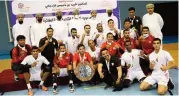  ??  ?? Oman Club players and officials with the OVA Second Division trophy