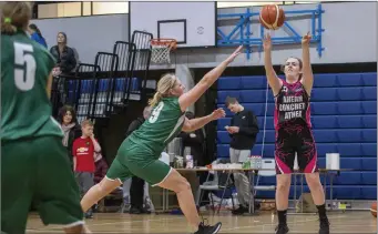  ??  ?? Action from the Division 3 Ladies Cup final between Horans Healthstor­es Tralee (green) and TK Vixens in the Tralee Sports Complex last Sunday