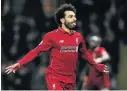  ?? Picture: RICHARD HEATHCOTE/ GETTY IMAGES ?? HIGH-FLYER: Mohamed Salah scored the opener for Liverpool as his side went on to win 3-0 against Watford at Vicarage Road on Saturday.