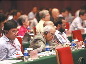  ?? PROVIDED TO CHINA DAILY ?? Foreign attendees listen at the think tank forum, which started on Monday and ends on Tuesday in Yunnan province.