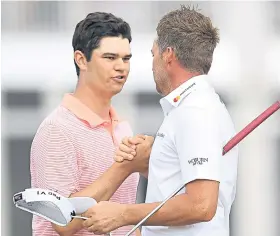  ??  ?? Tough to take: Beau Hossler congratula­tes Poulter after victory is snatched away