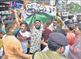  ?? PTI ?? Police attempt to stop TMC activists during BJP's by-poll election campaign in support of party candidate Priyanka Tibrewal at Bhabanipur constituen­cy in Kolkata on Monday.