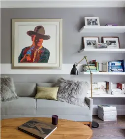  ??  ?? Top left: A 23-foot custom Missoni rug ties the decor’s myriad color schemes together. Top right: The colors in a Warhol portrait of John Wayne are echoed in the placement of books on floating shelves.
Bottom left: A sitting room of natural hues...