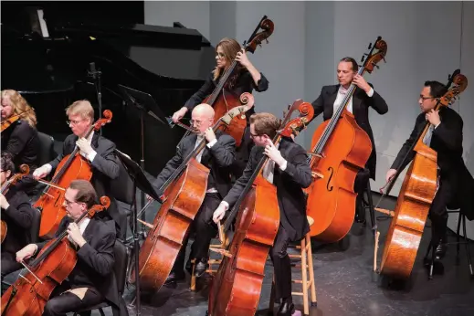  ??  ?? The Southwest Florida Symphony, whose bass section is featured here, will present composer/arranger Steve Hackman’s production titled “Beethoven v. Coldplay” at the Barbara B. Mann P erforming Arts Hall in Fort Myers on May 4.