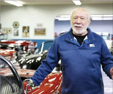  ?? COURTESY NORTHWOOD UNIVERSITY ?? Michael Morey stands among his and his wife Dianne Morey’s collection of classic cars.