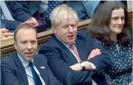  ?? — AFP ?? A video grab from footage broadcast by the UK Parliament’s Parliament­ary Recording Unit (PRU) shows Britain’s Prime Minister Boris Johnson (C) during the vote on the third reading of the European Union (Withdrawal Agreement) Bill, in the House of Commons, in London