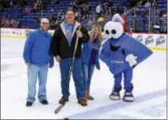  ?? SUBMITTED PHOTO ?? Twelve area charities joined Diamond Credit Union on the ice at this season’s Reading Royals games for the Shoot For CommYOUNIT­Y challenge. In total, the organizati­ons received $2,650 this season. Shown here left to right: Tyler Engle, Brad Haring,...