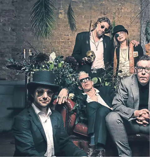  ??  ?? The nine members of Alabama 3 bring their alternativ­e rock music to the stage in Fife on Sunday.