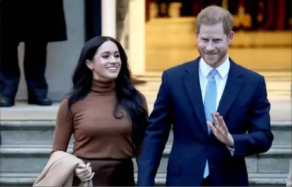  ?? Chris Jackson/Getty Images ?? Prince Harry, Duke of Sussex, and Meghan Markle, Duchess of Sussex, depart Canada House on Jan. 7 in London.