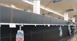  ??  ?? Toilet paper is out of stock at a grocery store. (TNS)