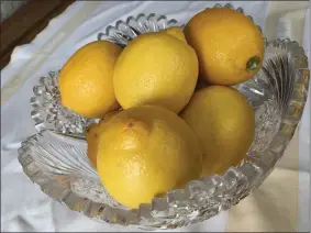  ?? PHOTOS BY JANET PODOLAK — THE NEWS-HERALD ?? Lemons, useful in many dishes, sit in a crystal bowl.