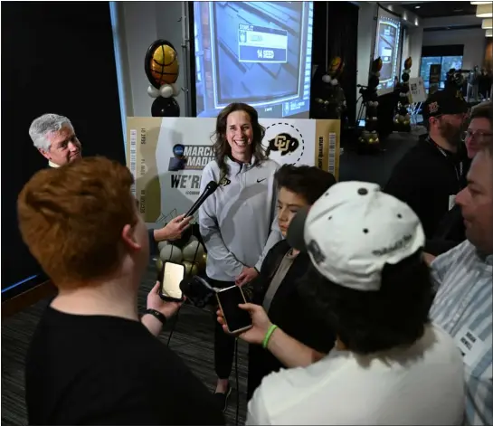  ?? HELEN H. RICHARDSON — THE DENVER POST ?? Colorado women’s basketball coach JR Payne takes questions from the media during a watch party Sunday in the Touchdown Club at Dal Ward Center in Boulder. The Buffs earned a No. 5seed in NCAA Tournament and play Friday in Manhattan, Kan.,against MVC champion Drake.