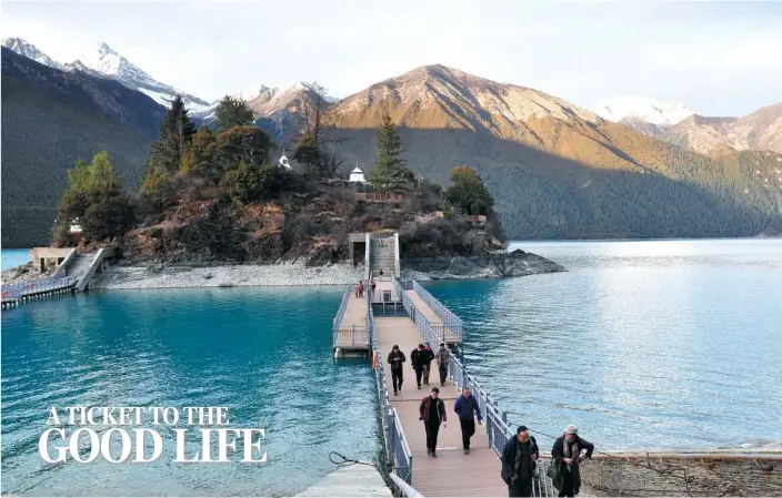  ?? PHOTOS BY LIU XIANGRUI / CHINA DAILY ?? Basum Lake is renowned for the bluish-green water that gives it its name and the lush vegetation in the surroundin­g land.