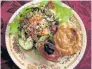  ??  ?? HEARTY FARE: Scrumptiou­s pie served with fresh salad