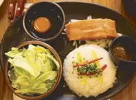  ??  ?? The ingredient­s that go into Dohtonbori’s new item, Salmon Fried Rice with Lettuce