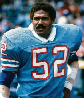  ?? Focus on Sport / Getty Images ?? Linebacker Robert Brazile plied his trade in the NFL for 10 years, all of them with the Oilers. He started and played 147 games, starring for legendary coach Bum Phillips in the Luv Ya Blue era, when shoulder pads were much larger.