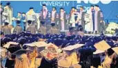  ?? ?? Jessica Samuels wears a decorated graduation cap with a message declaring her goals during the 2022 Commenceme­nt ceremony at Nova Southeaste­rn University.