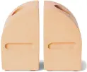  ?? ?? AdeleW Design Set of 2 Taper Candle Holders, Peachy Pink Jesmonite,
MADE.com.